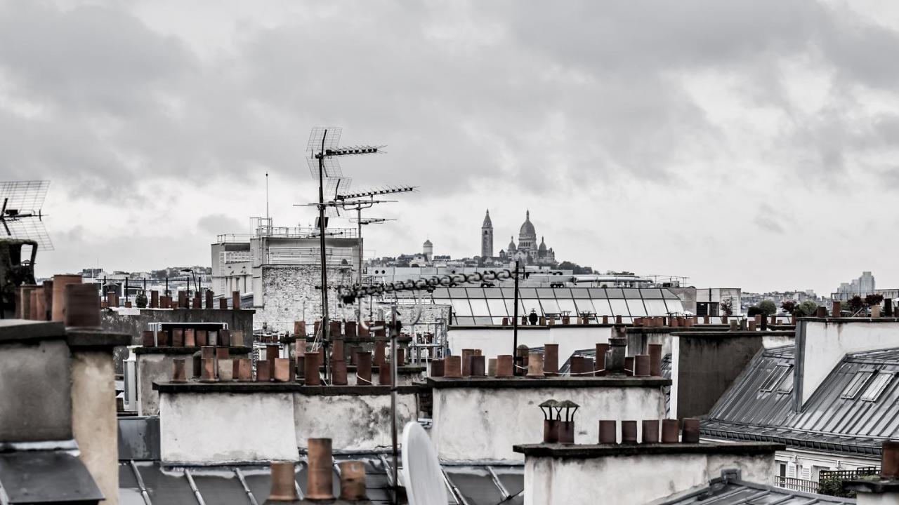 Monsieur George Hotel & Spa - Champs-Elysees Paříž Exteriér fotografie View of Paris rooftops